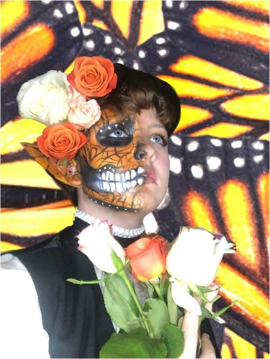 An image of a girl who painted her face for Dia de Los Muertos