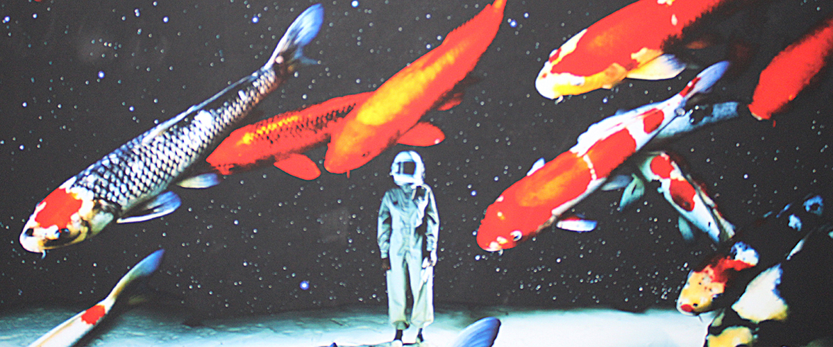 Staff Art Show Art Image with Koi Fish and Astronaut